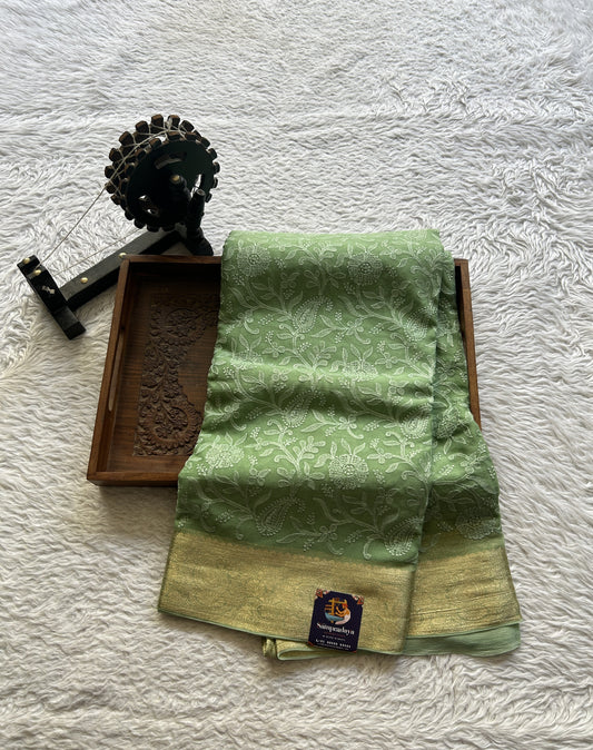 Semi Georgette Saree Light Green Colored Elegantly Paired with a Zari Border. - Sampradaya Designer Studio