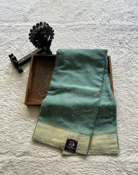 Semi Georgette Saree Jade Colored Elegantly Paired with a Zari Border. - Sampradaya Designer Studio