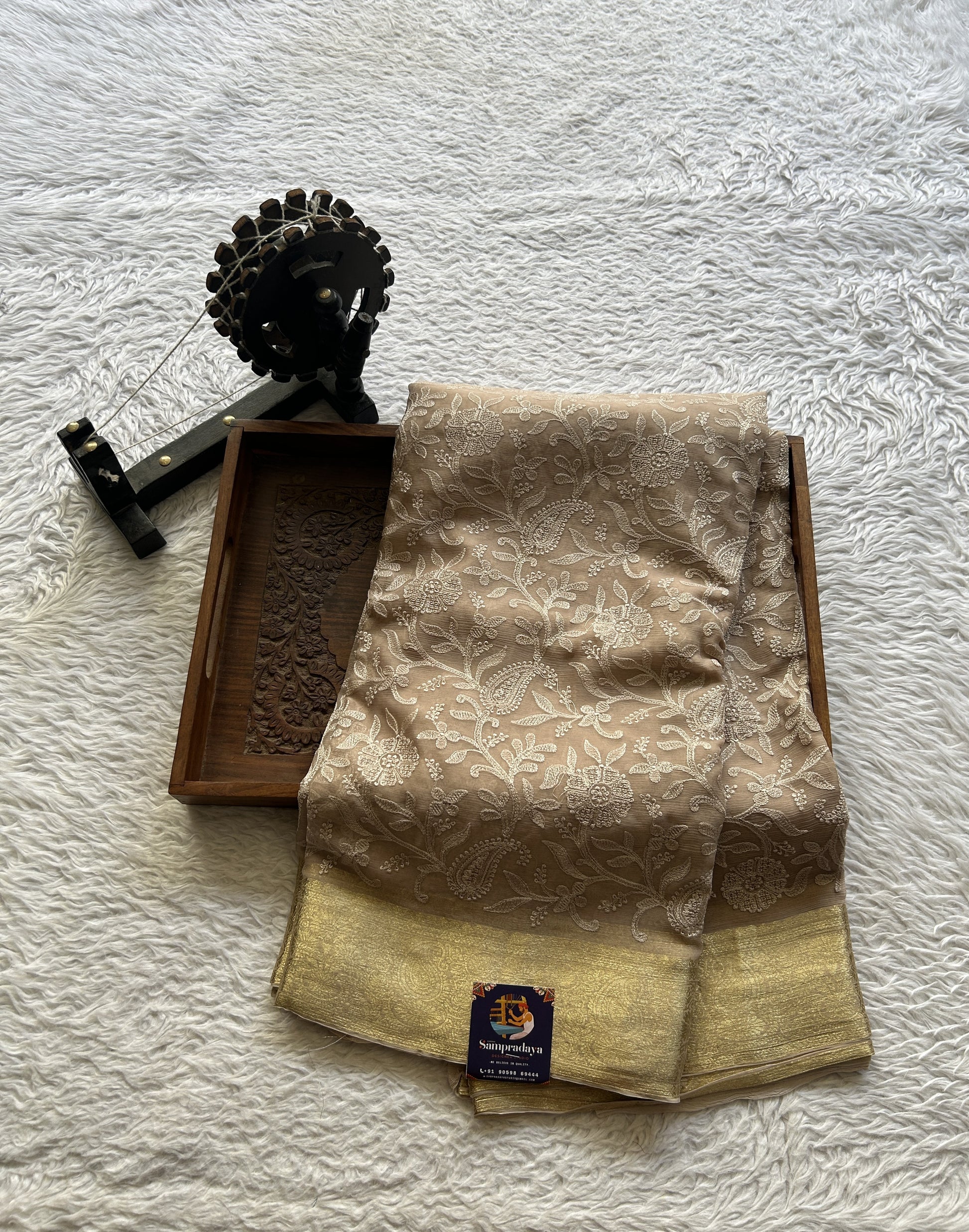 Semi Georgette Saree Very Light Brown Colored Elegantly Paired with a Zari Border. - Sampradaya Designer Studio
