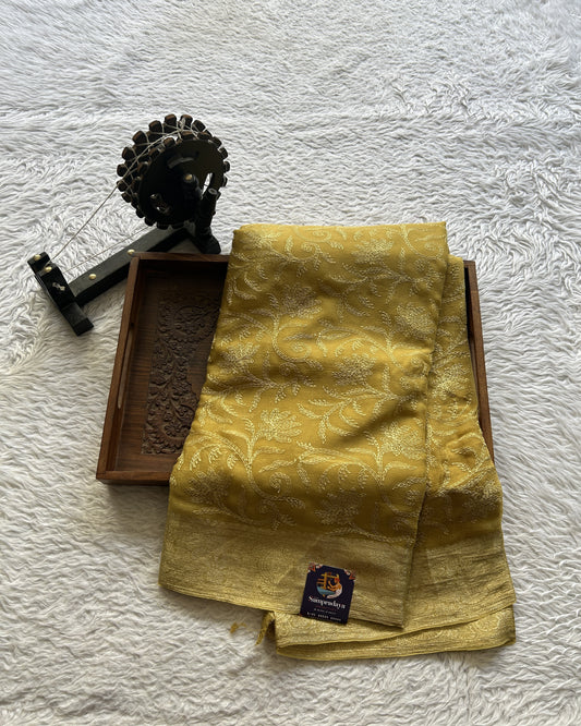 Semi Georgette Saree Yellow Colored Elegantly Paired with a Zari Border. - Sampradaya Designer Studio