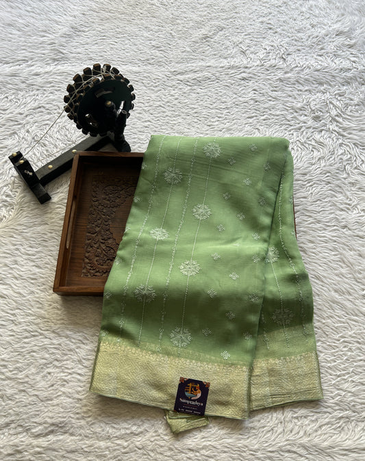 Semi Georgette Saree Mint Colored Elegantly Paired with a Zari Border. - Sampradaya Designer Studio
