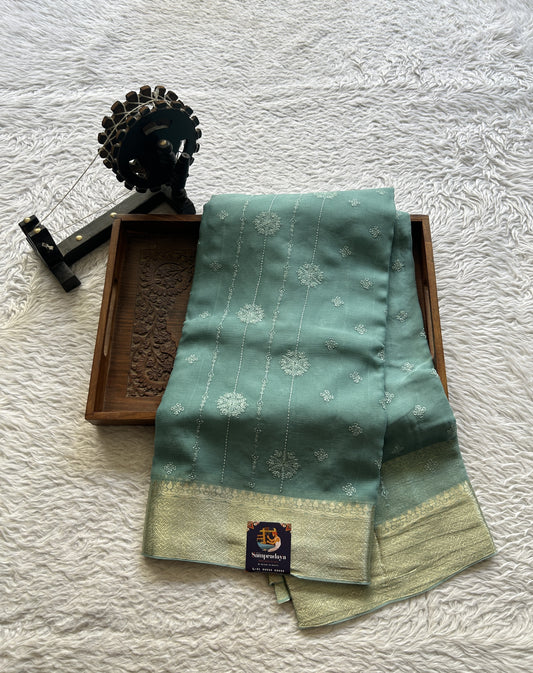 Semi Georgette Saree Blue Colored Elegantly Paired with a Zari Border. - Sampradaya Designer Studio