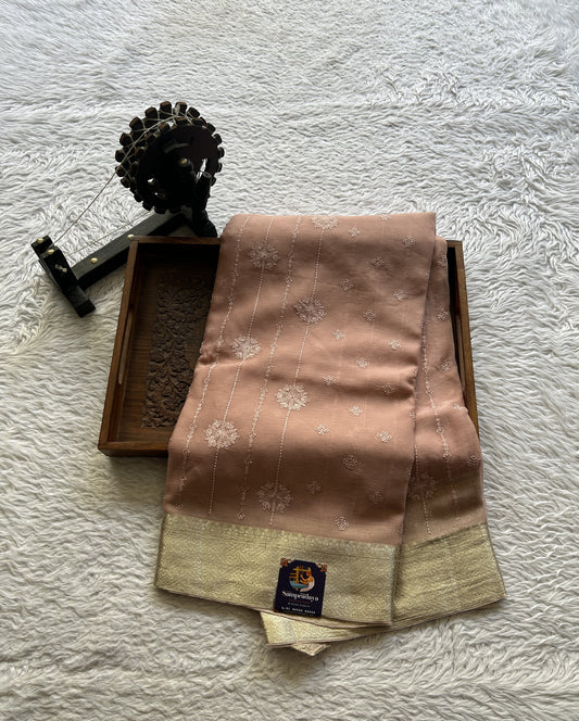 Semi Georgette Saree Light Peach Colored Exquisite with a Zari Border. - Sampradaya Designer Studio