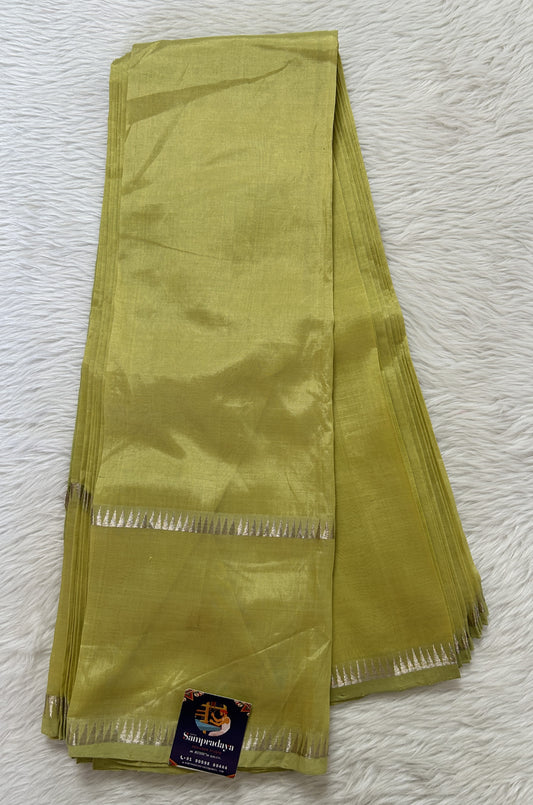 Mangalagiri Plain Pattu Saree Lemon Green colored Saree complemented with a Silver Mangalagiri Gap Border - Sampradaya Designer Studio