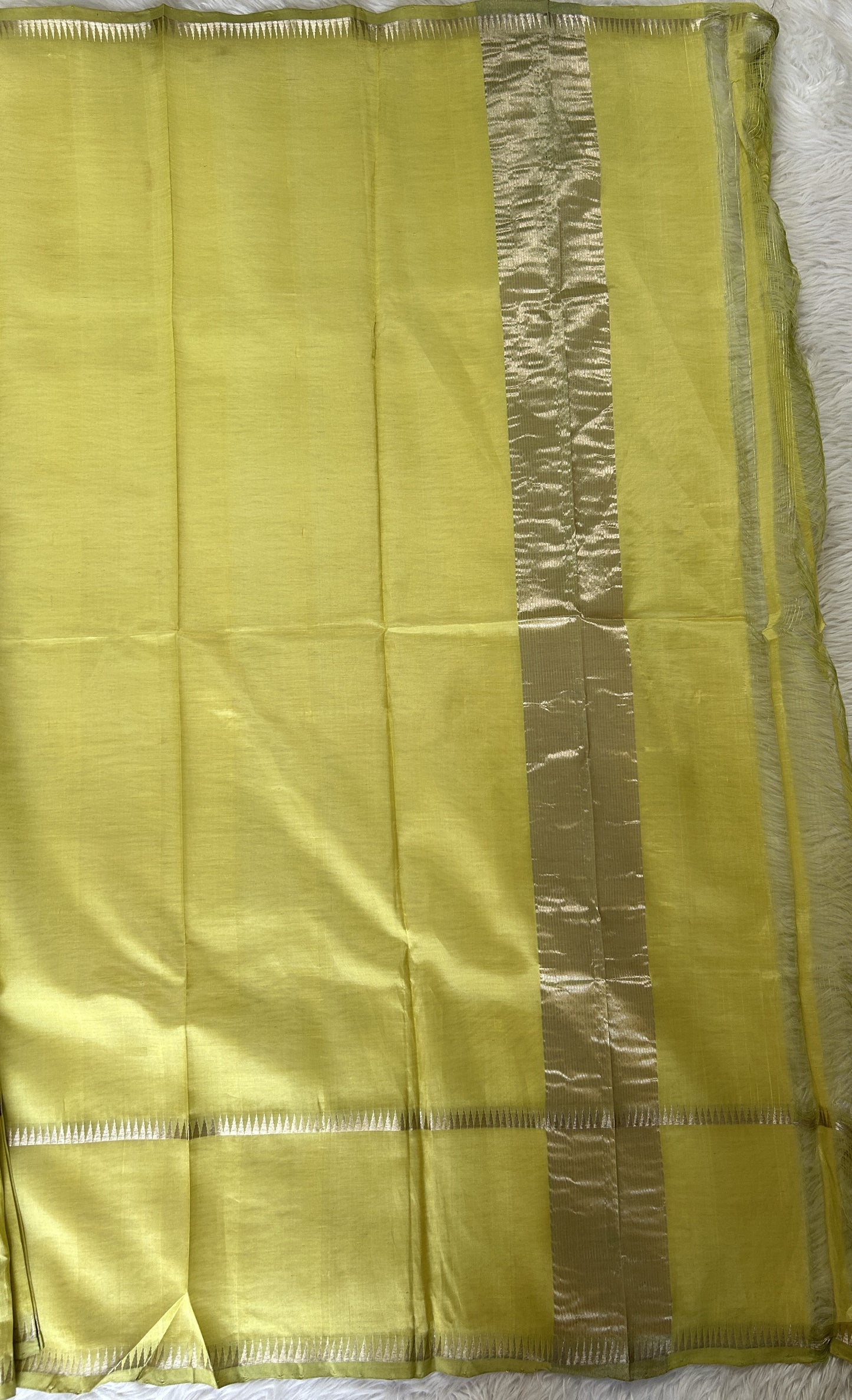 Mangalagiri Plain Pattu Saree Lemon Green colored Saree complemented with a Silver Mangalagiri Gap Border - Sampradaya Designer Studio