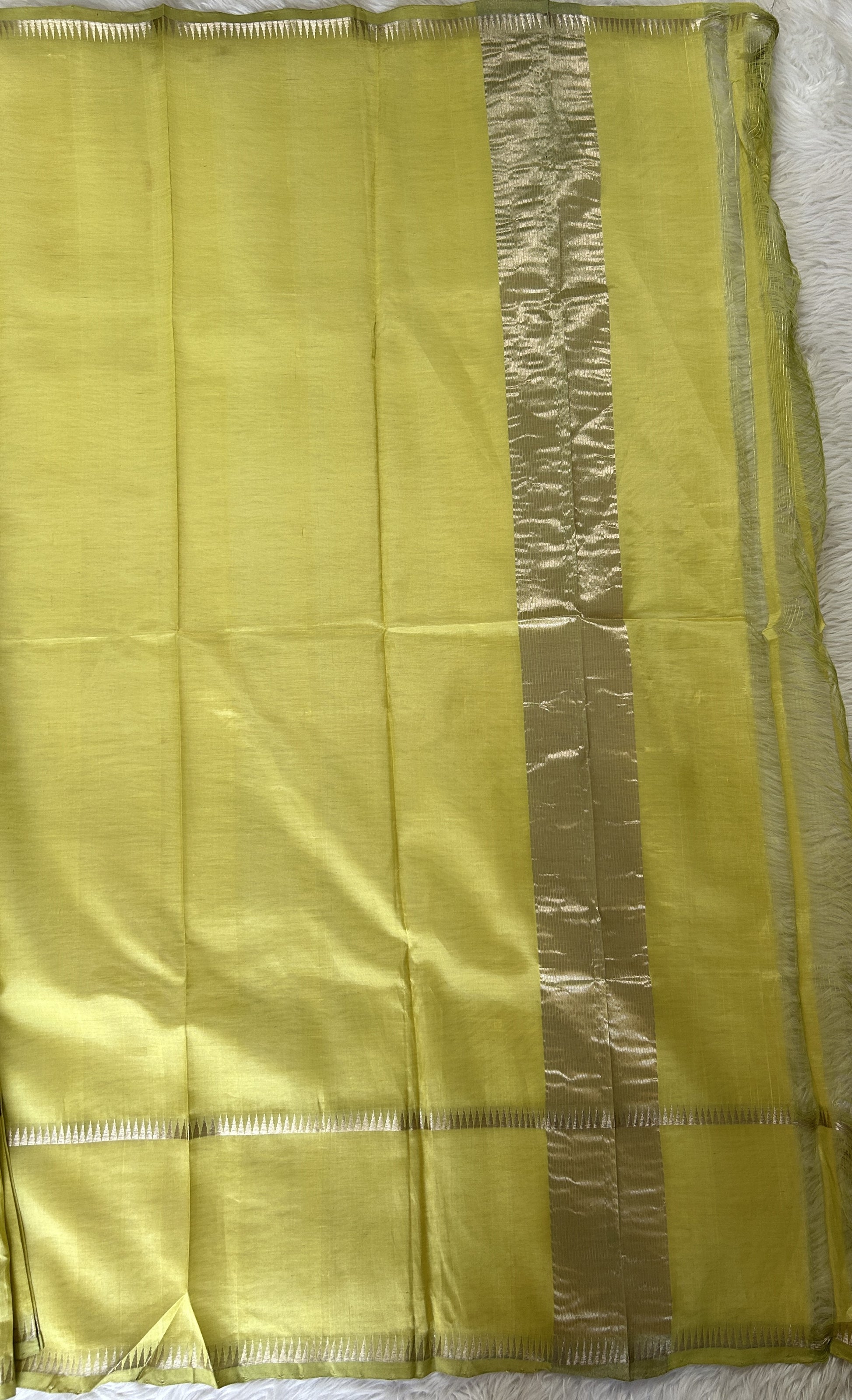 Mangalagiri Plain Pattu Saree Lemon Green colored Saree complemented with a Silver Mangalagiri Gap Border - Sampradaya Designer Studio