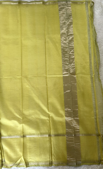 Mangalagiri Plain Pattu Saree Lemon Green colored Saree complemented with a Silver Mangalagiri Gap Border - Sampradaya Designer Studio