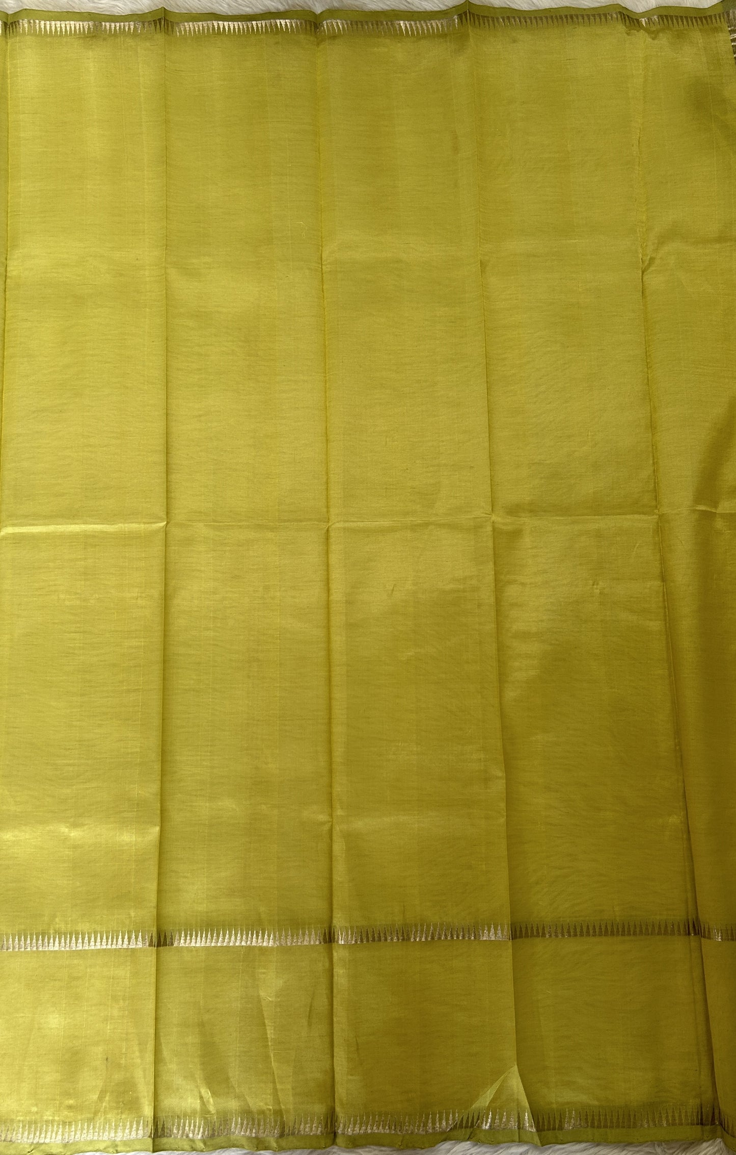 Mangalagiri Plain Pattu Saree Lemon Green colored Saree complemented with a Silver Mangalagiri Gap Border - Sampradaya Designer Studio