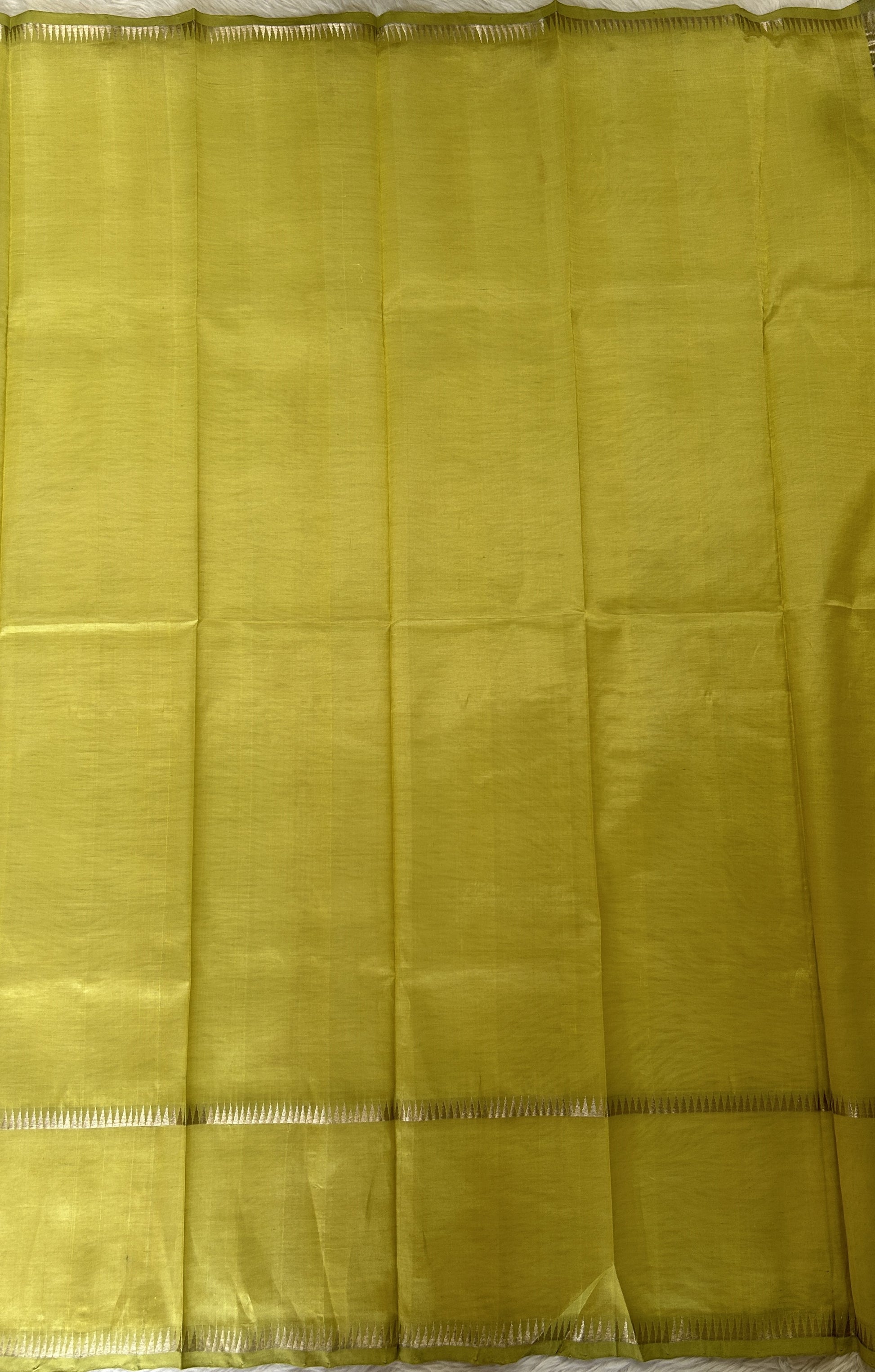 Mangalagiri Plain Pattu Saree Lemon Green colored Saree complemented with a Silver Mangalagiri Gap Border - Sampradaya Designer Studio