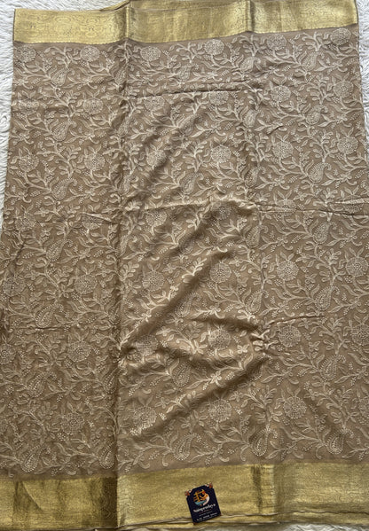 Semi Georgette Saree Very Light Brown Colored Elegantly Paired with a Zari Border. - Sampradaya Designer Studio