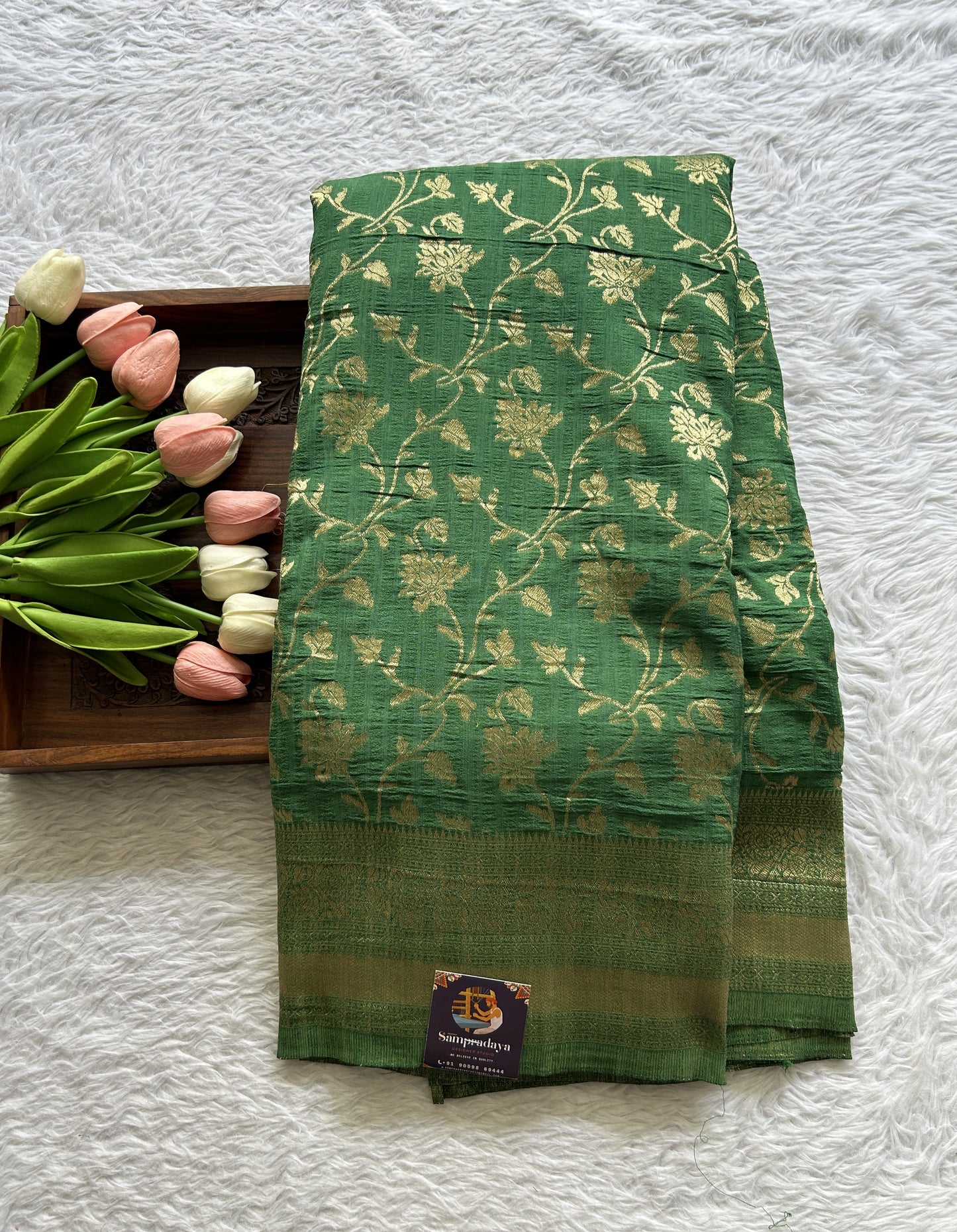 Semi Georgette Saree Green Colored Complemented with a Zari Border. - Sampradaya Designer Studio