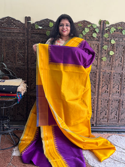 Gadwal Silk Saree Grape Colored Complemented With Gold Zari Border - Sampradaya Designer Studio