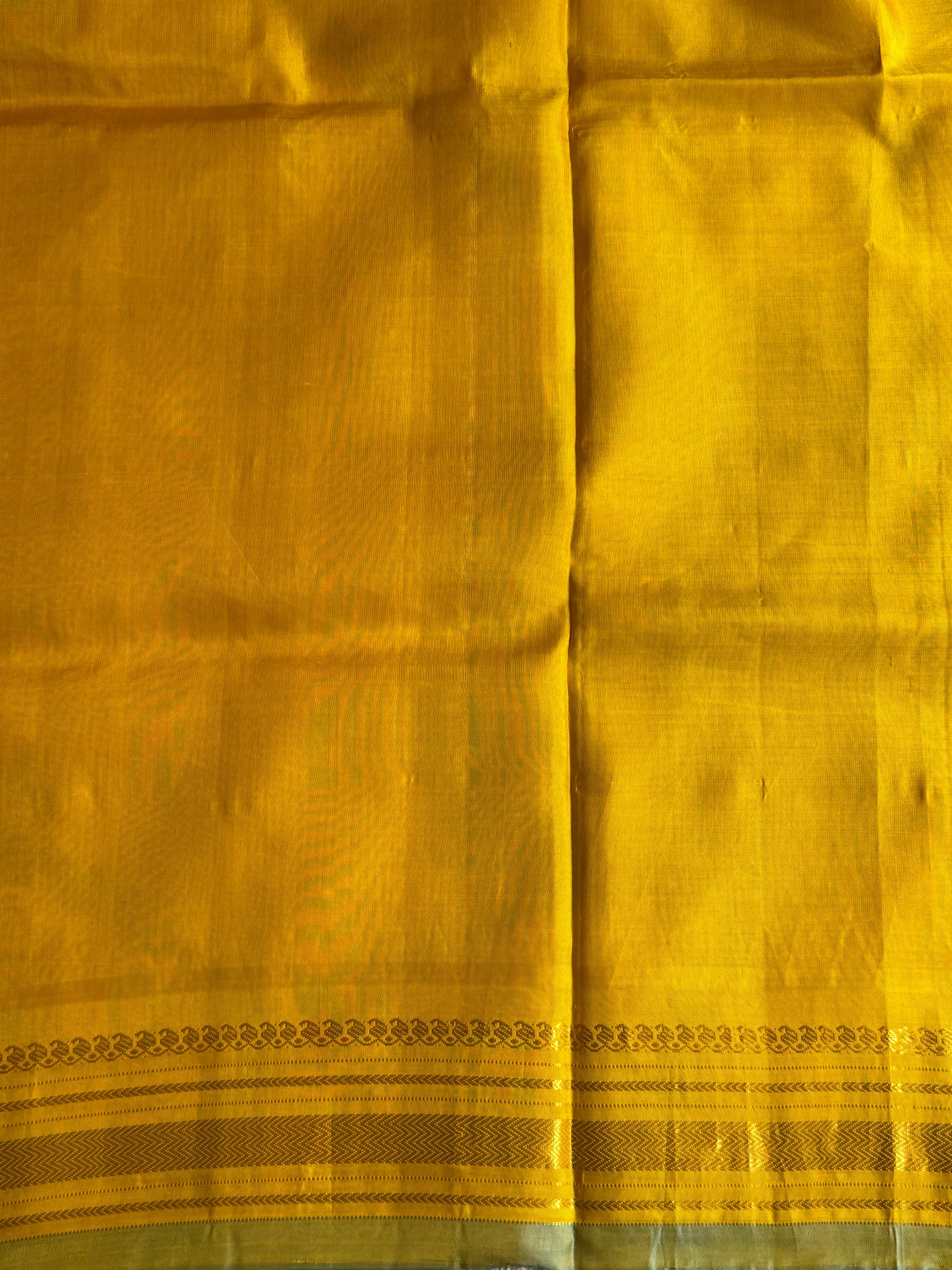 Gadwal Silk Saree Grape Colored Complemented With Gold Zari Border - Sampradaya Designer Studio