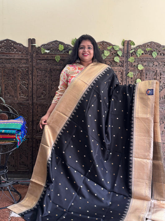 Gadwal Silk Saree Black Colored Complemented With Gold Zari Border