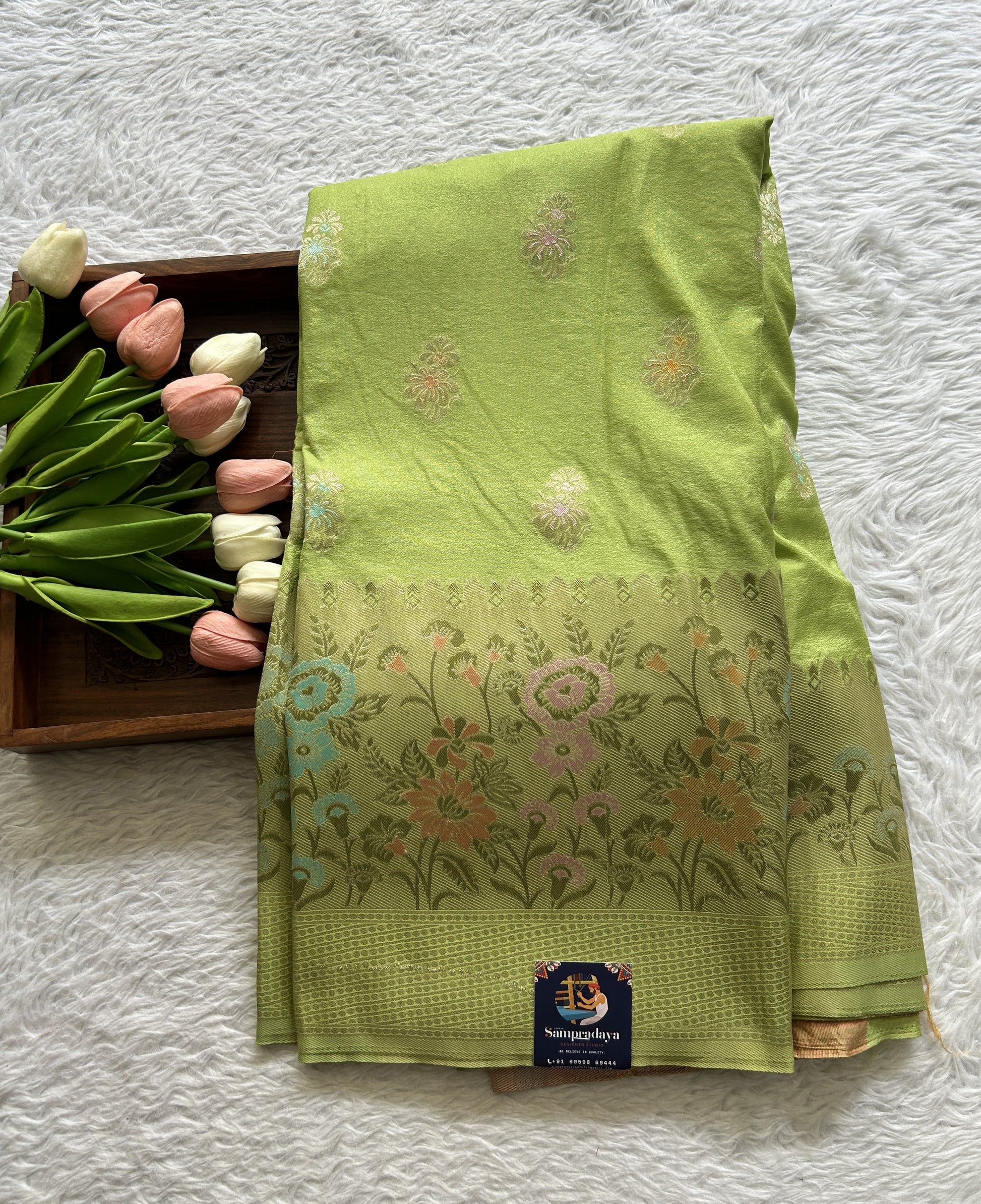 Semi Georgette Saree Lime Green Colored Complemented with a Zari Border. - Sampradaya Designer Studio