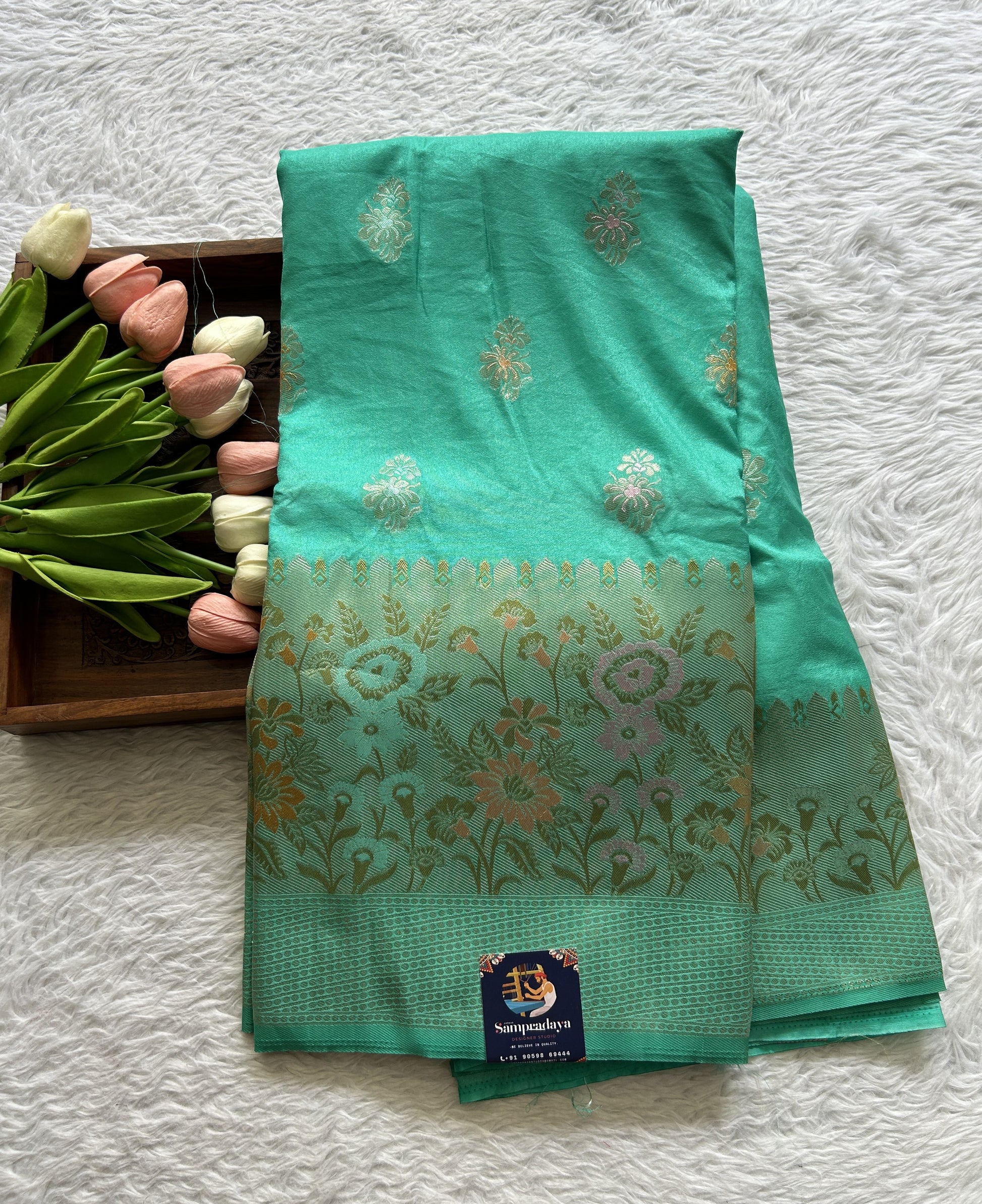 Semi Georgette Saree Sea Green Colored Complemented with a Zari Border. - Sampradaya Designer Studio