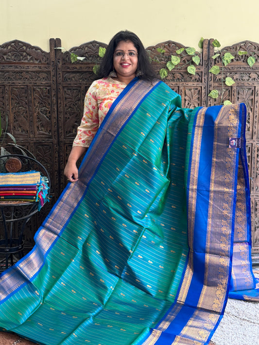 Gadwal Silk Saree Jungle Colored Complemented With Gold Zari Border