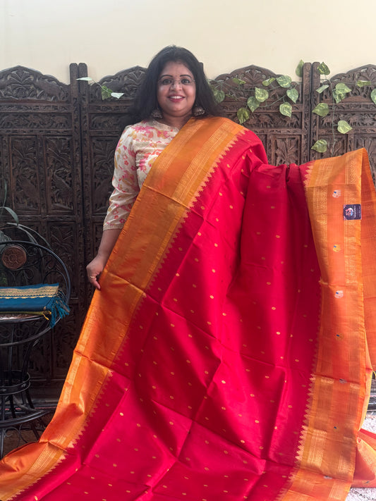 Gadwal Silk Saree Red Colored Complemented With Gold Zari Border