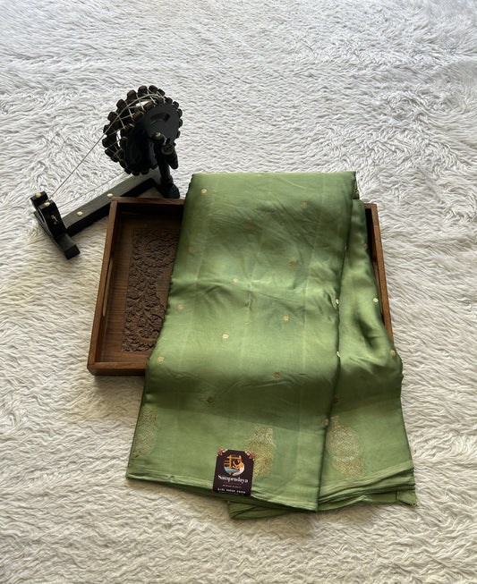 Mona Silk Saree Green Colored Complemented with a Buti Border. - Sampradaya Designer Studio