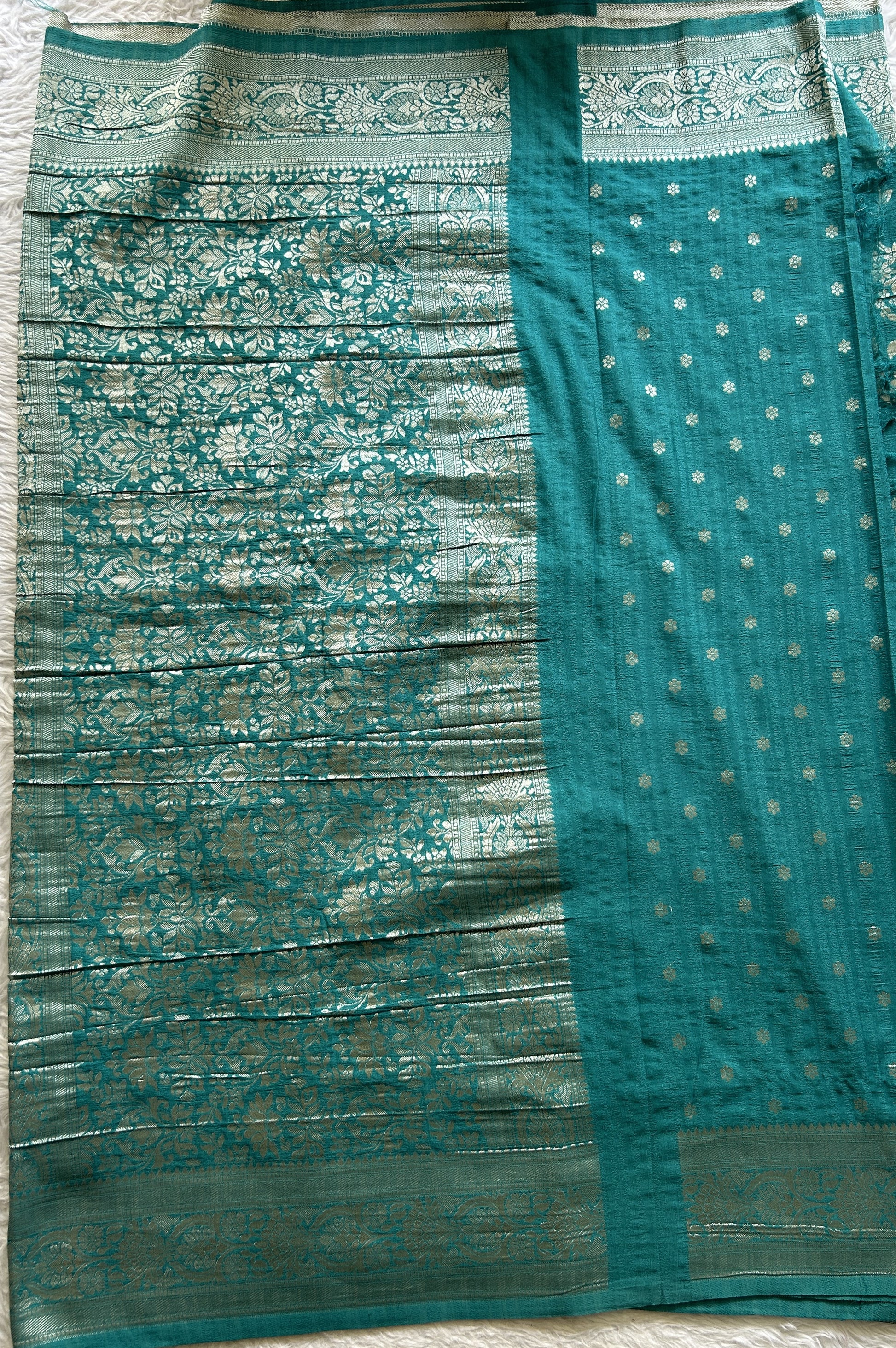 Semi Georgette Saree Turquoise Blue Colored Complemented with a Zari Border. - Sampradaya Designer Studio
