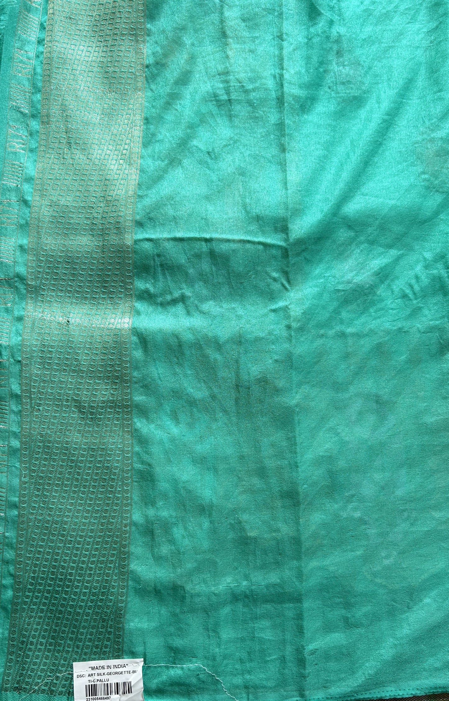 Semi Georgette Saree Sea Green Colored Complemented with a Zari Border. - Sampradaya Designer Studio