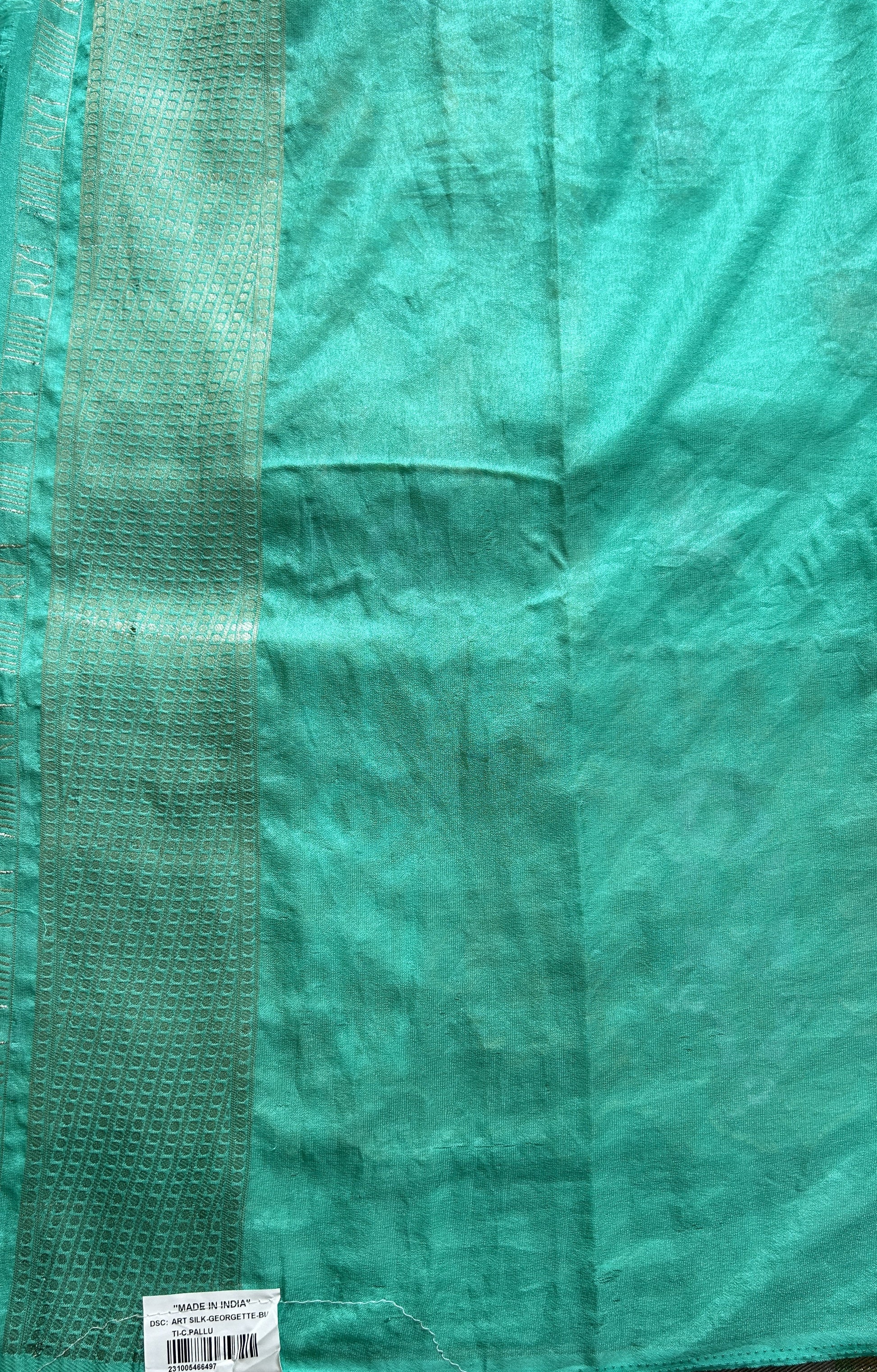Semi Georgette Saree Sea Green Colored Complemented with a Zari Border. - Sampradaya Designer Studio