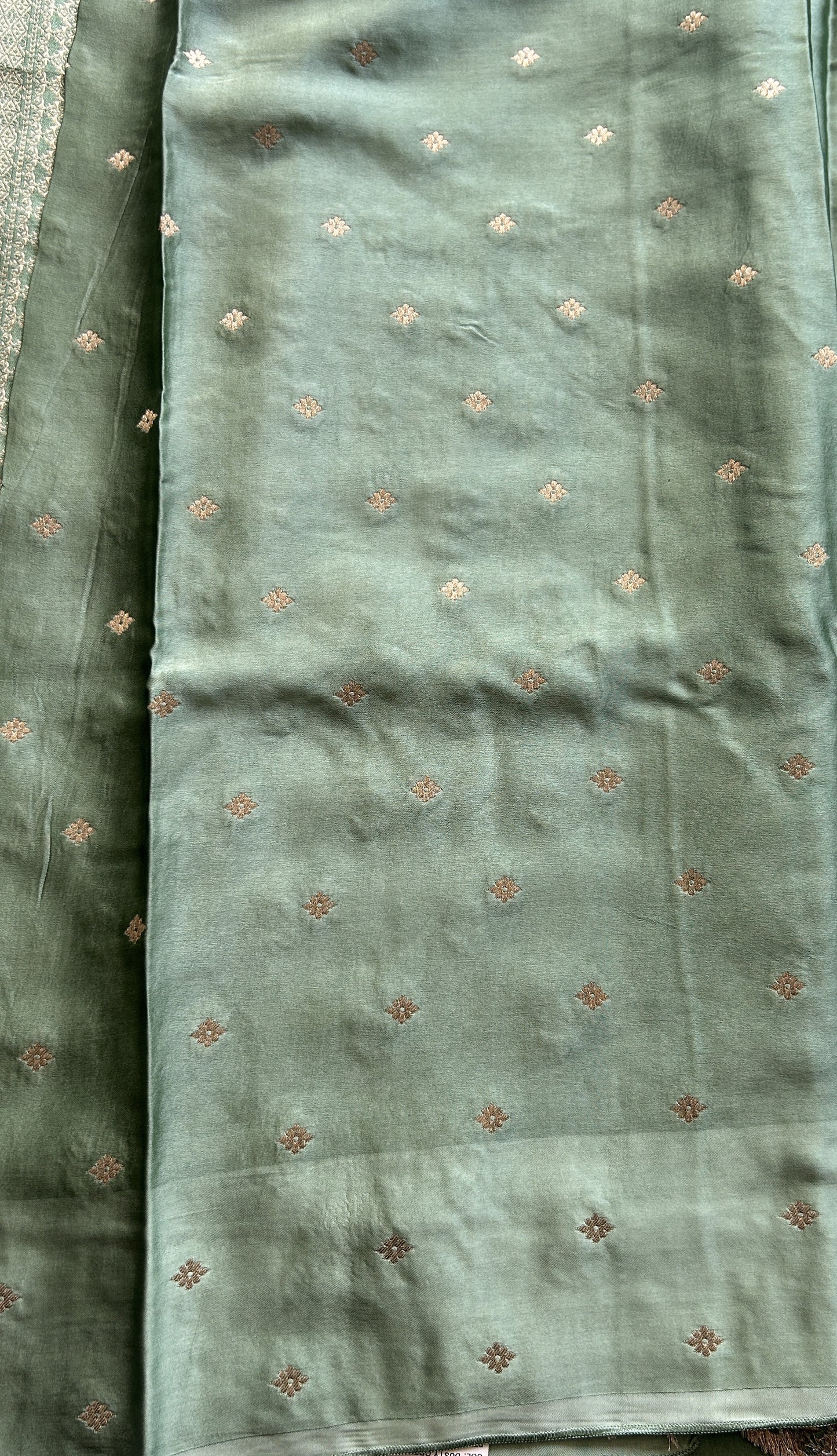 Mona Silk Saree Green Colored Complemented with a Buti Border. - Sampradaya Designer Studio