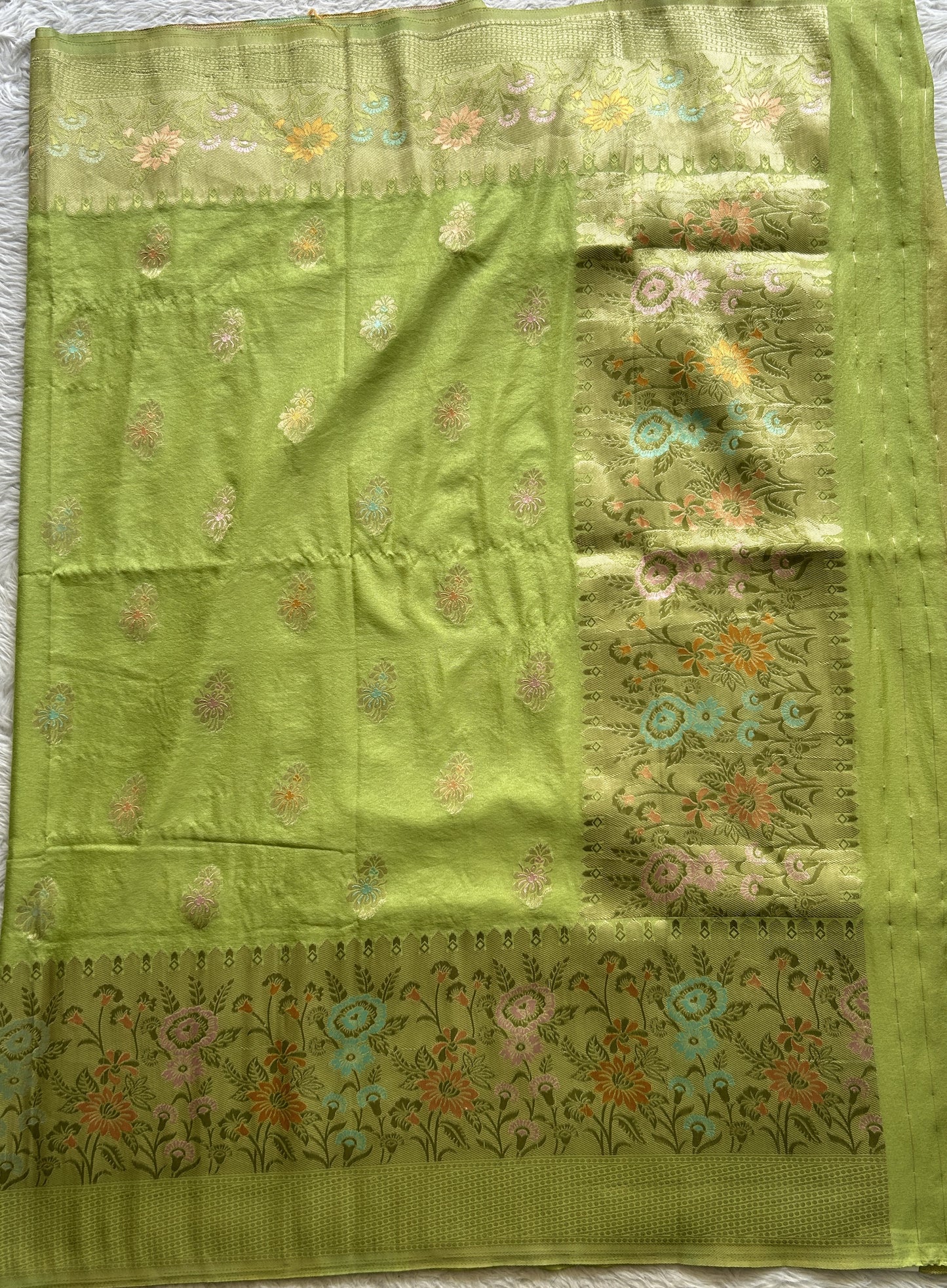Semi Georgette Saree Lime Green Colored Complemented with a Zari Border. - Sampradaya Designer Studio