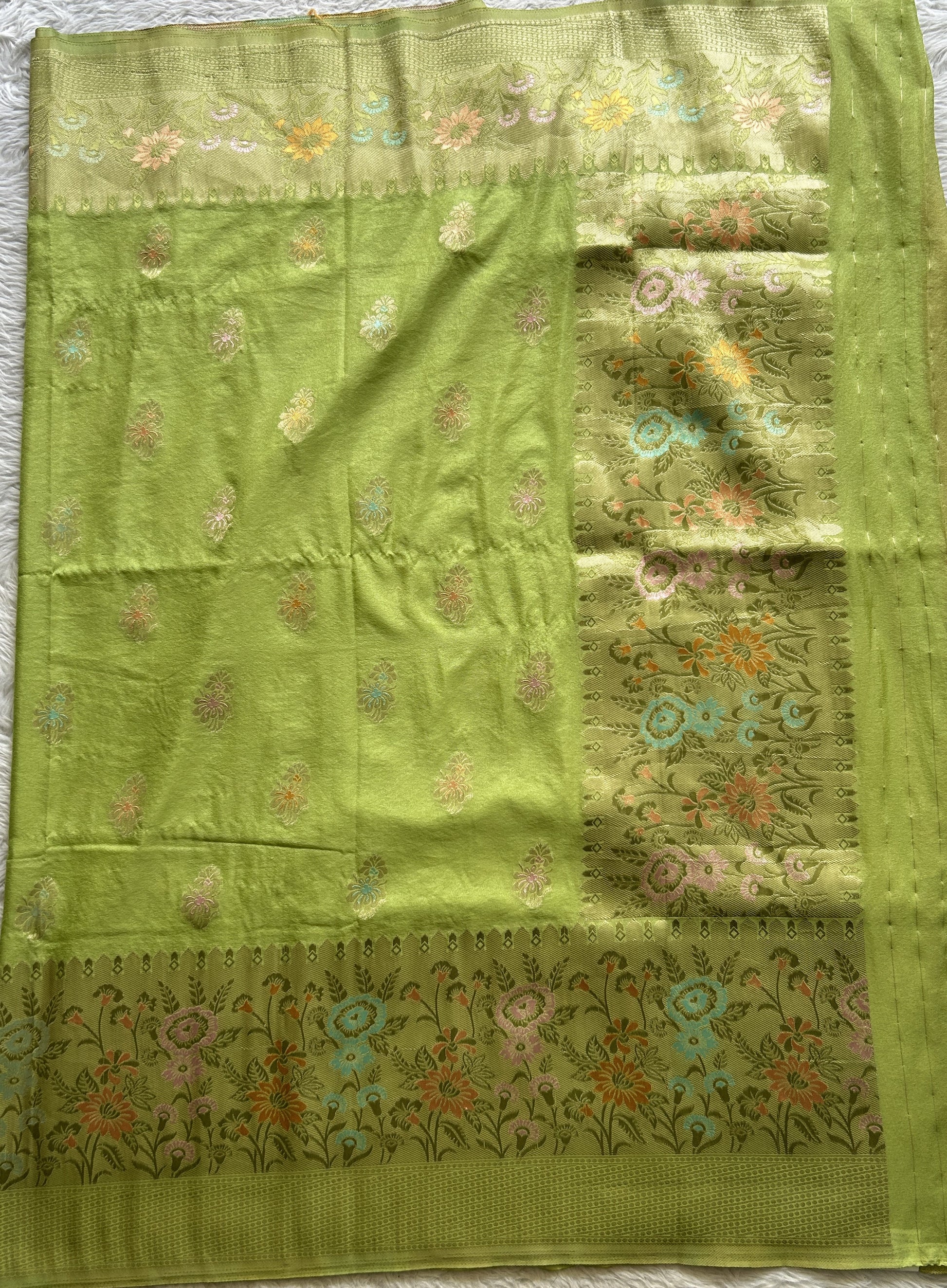Semi Georgette Saree Lime Green Colored Complemented with a Zari Border. - Sampradaya Designer Studio