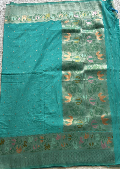 Semi Georgette Saree Sea Blue Colored Complemented with a Zari Border. - Sampradaya Designer Studio
