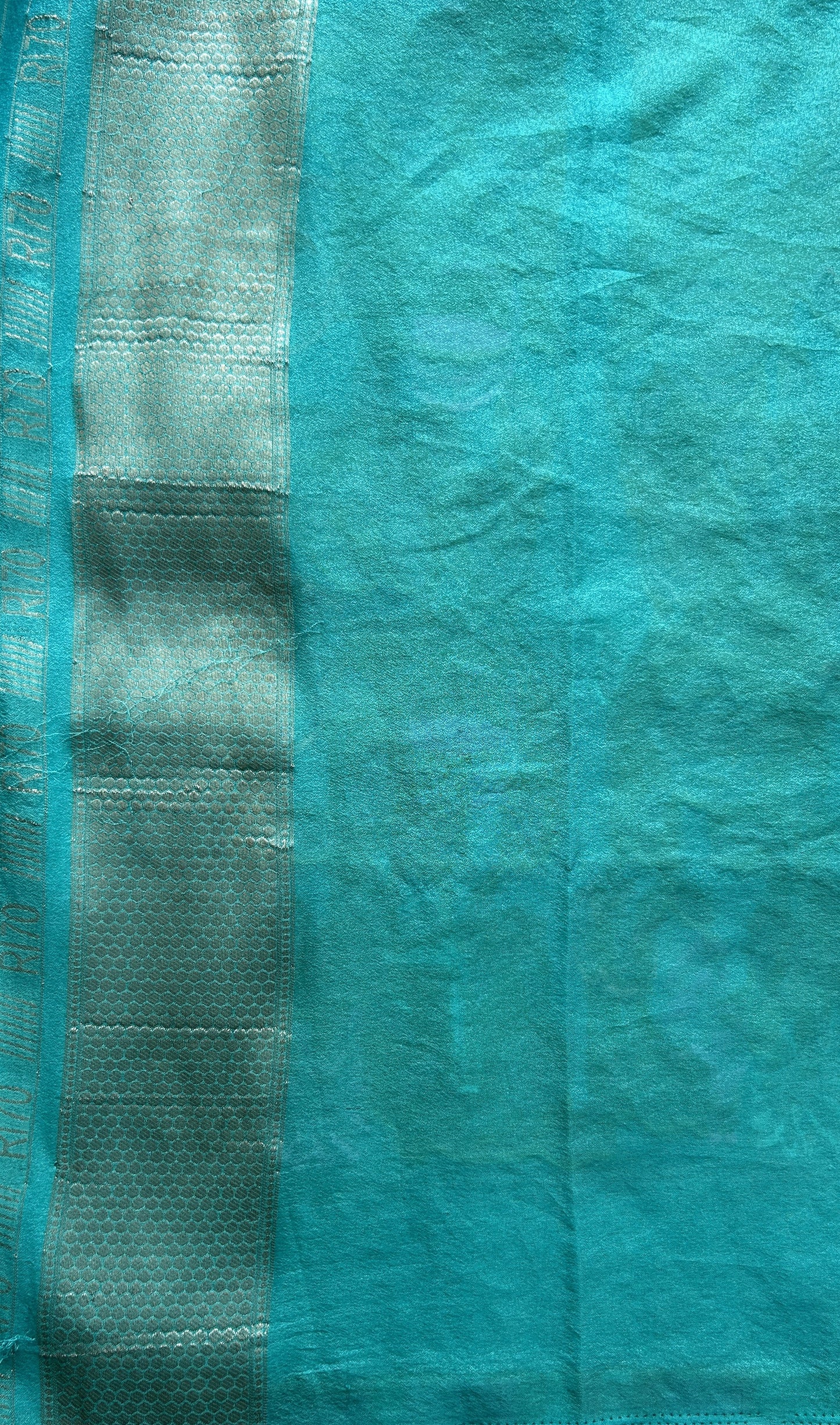 Semi Georgette Saree Sea Blue Colored Complemented with a Zari Border. - Sampradaya Designer Studio