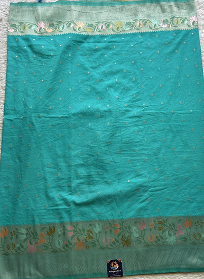 Semi Georgette Saree Sea Blue Colored Complemented with a Zari Border. - Sampradaya Designer Studio