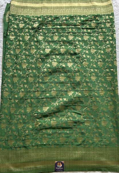 Semi Georgette Saree Green Colored Complemented with a Zari Border. - Sampradaya Designer Studio