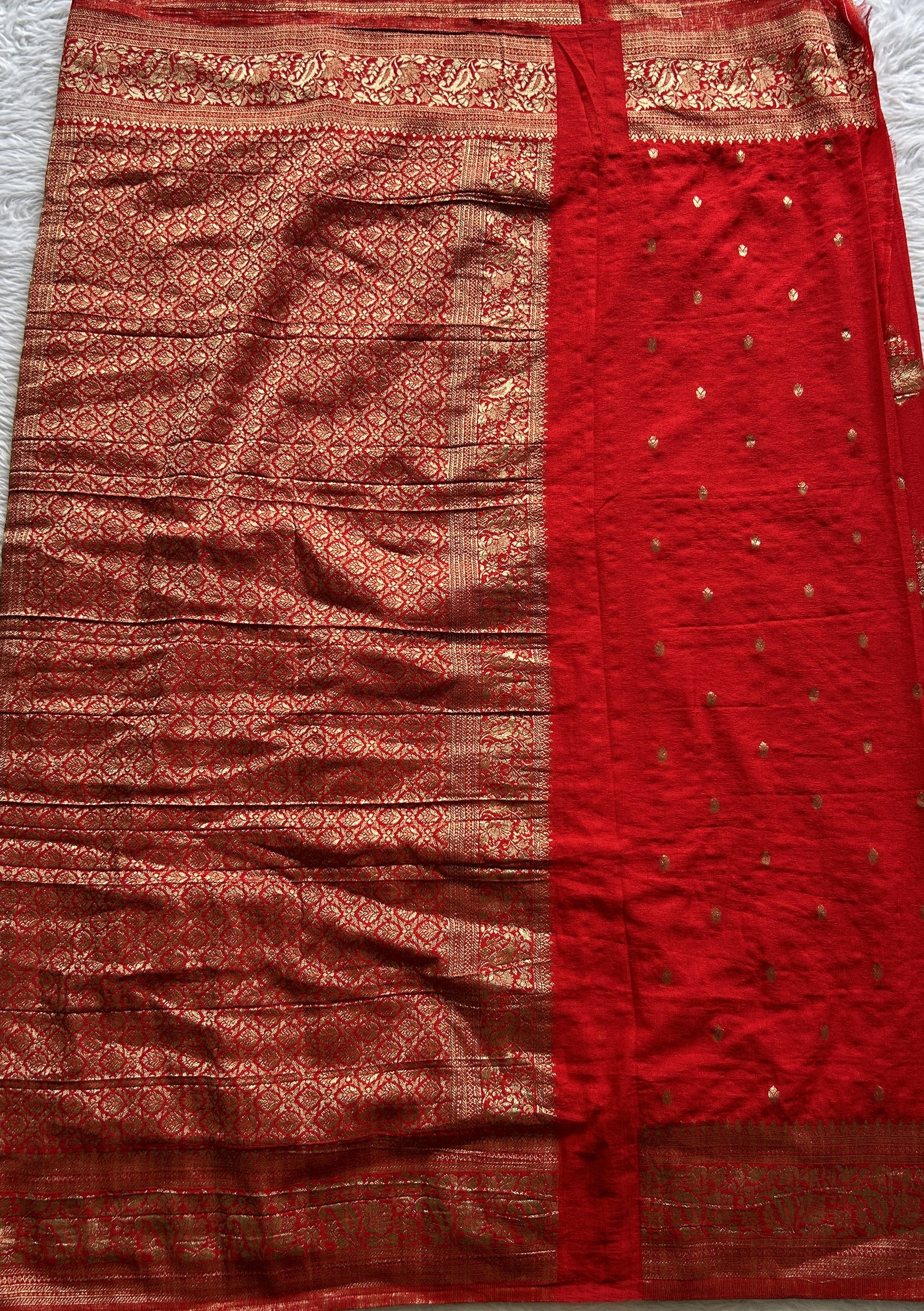 Semi Georgette Saree Red Colored Complemented with a Zari Border. - Sampradaya Designer Studio