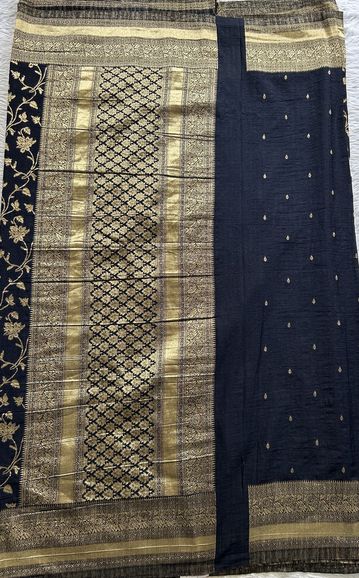 Semi Georgette Saree Carbon Blue Colored Complemented with a Zari Border. - Sampradaya Designer Studio