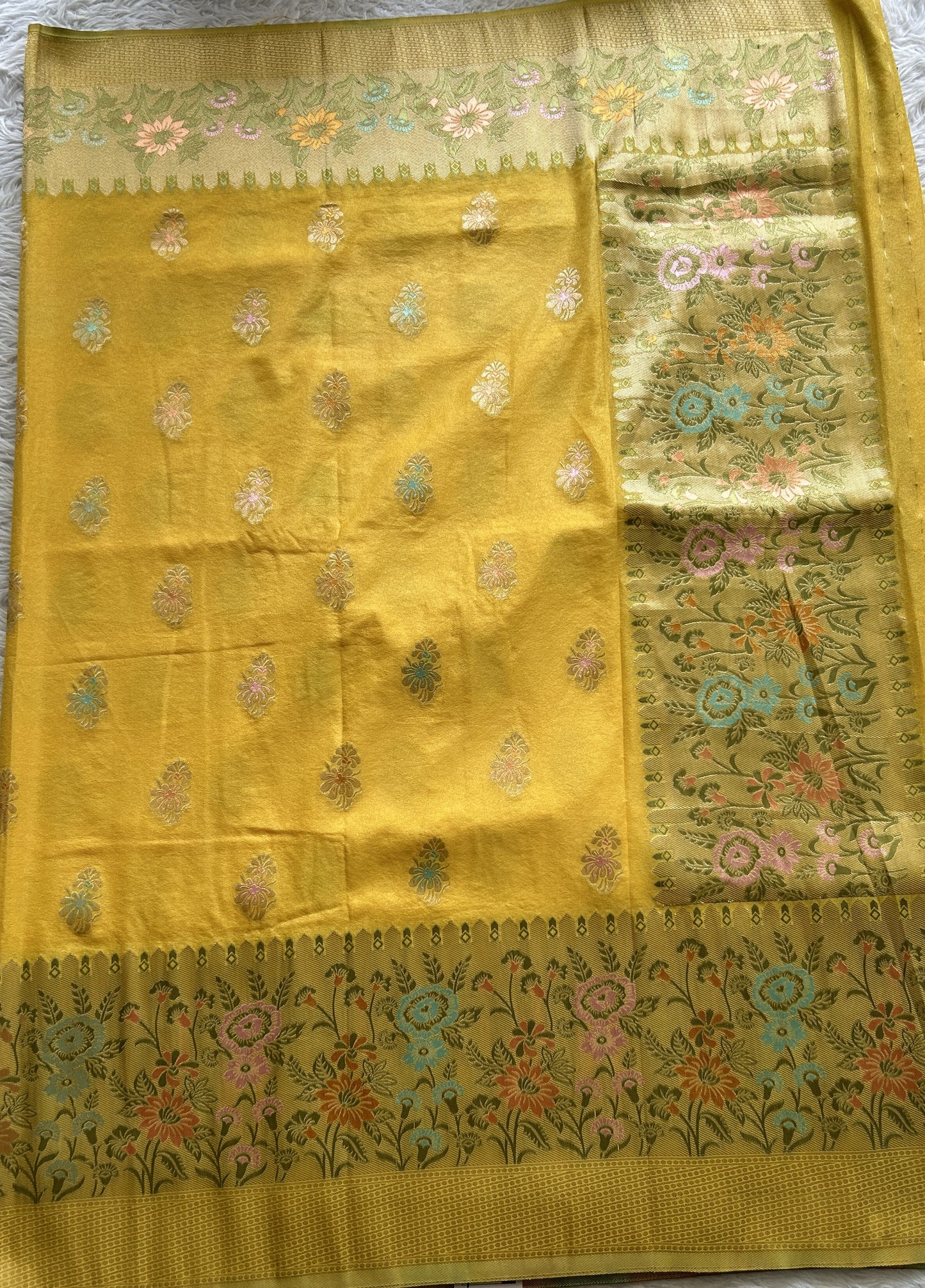 Semi Georgette Saree Yellow Colored Complemented with a Zari Border. - Sampradaya Designer Studio