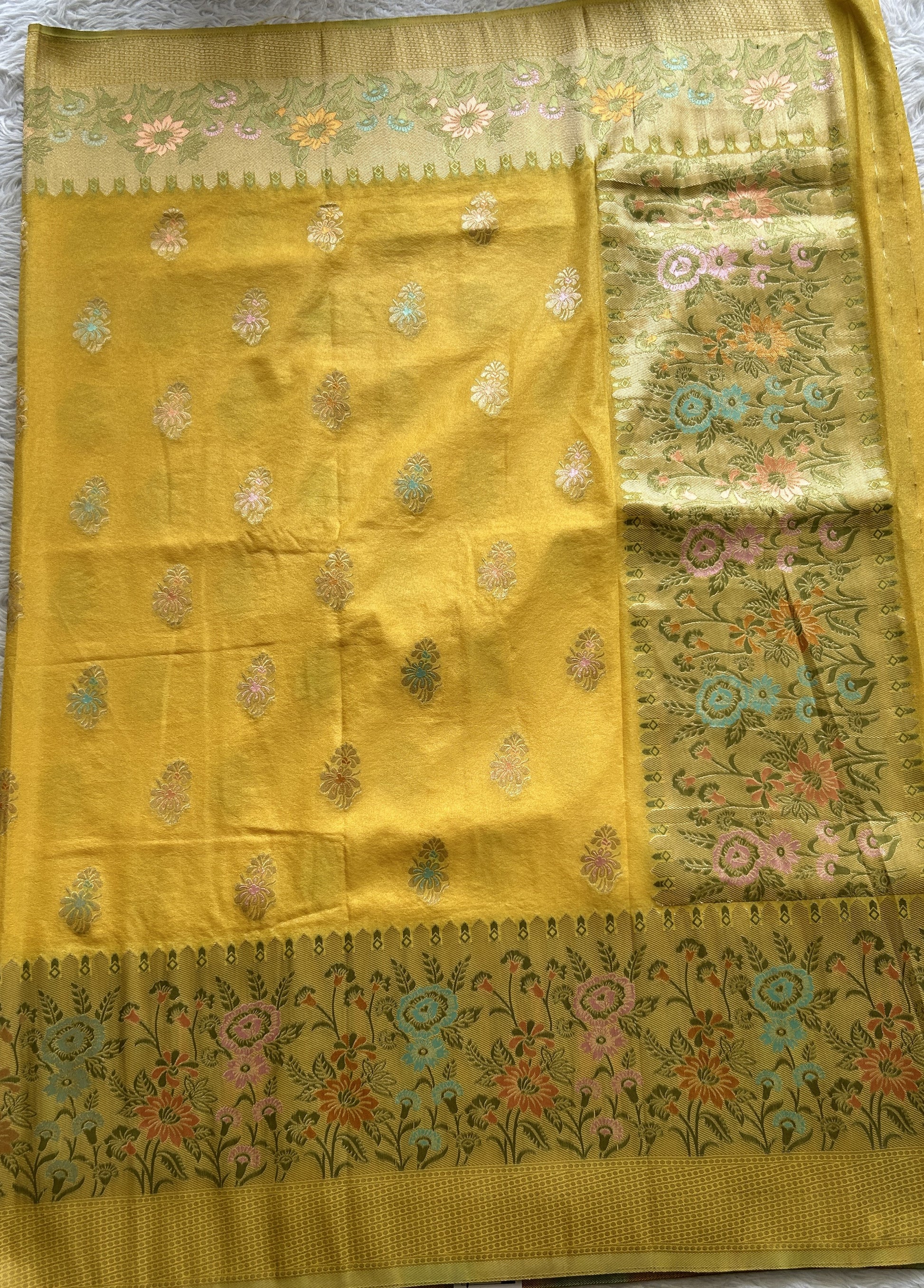 Semi Georgette Saree Yellow Colored Complemented with a Zari Border. - Sampradaya Designer Studio