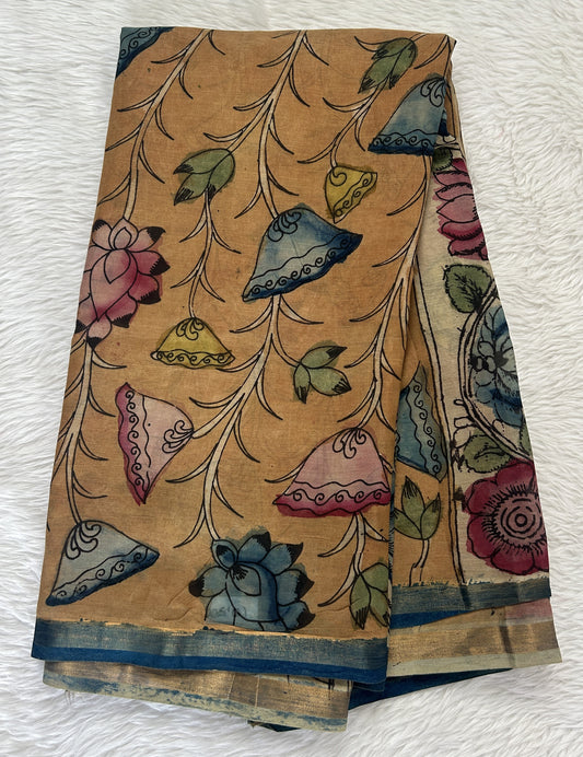 Pen Kalamkari Saree Pastel Brown colored allover saree complemented with a Dark Blue Colored Gold Zari border - Sampradaya Designer Studio