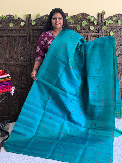 Gadwal Silk Saree Turquoise Colored Complemented With Plain Border - Sampradaya Designer Studio