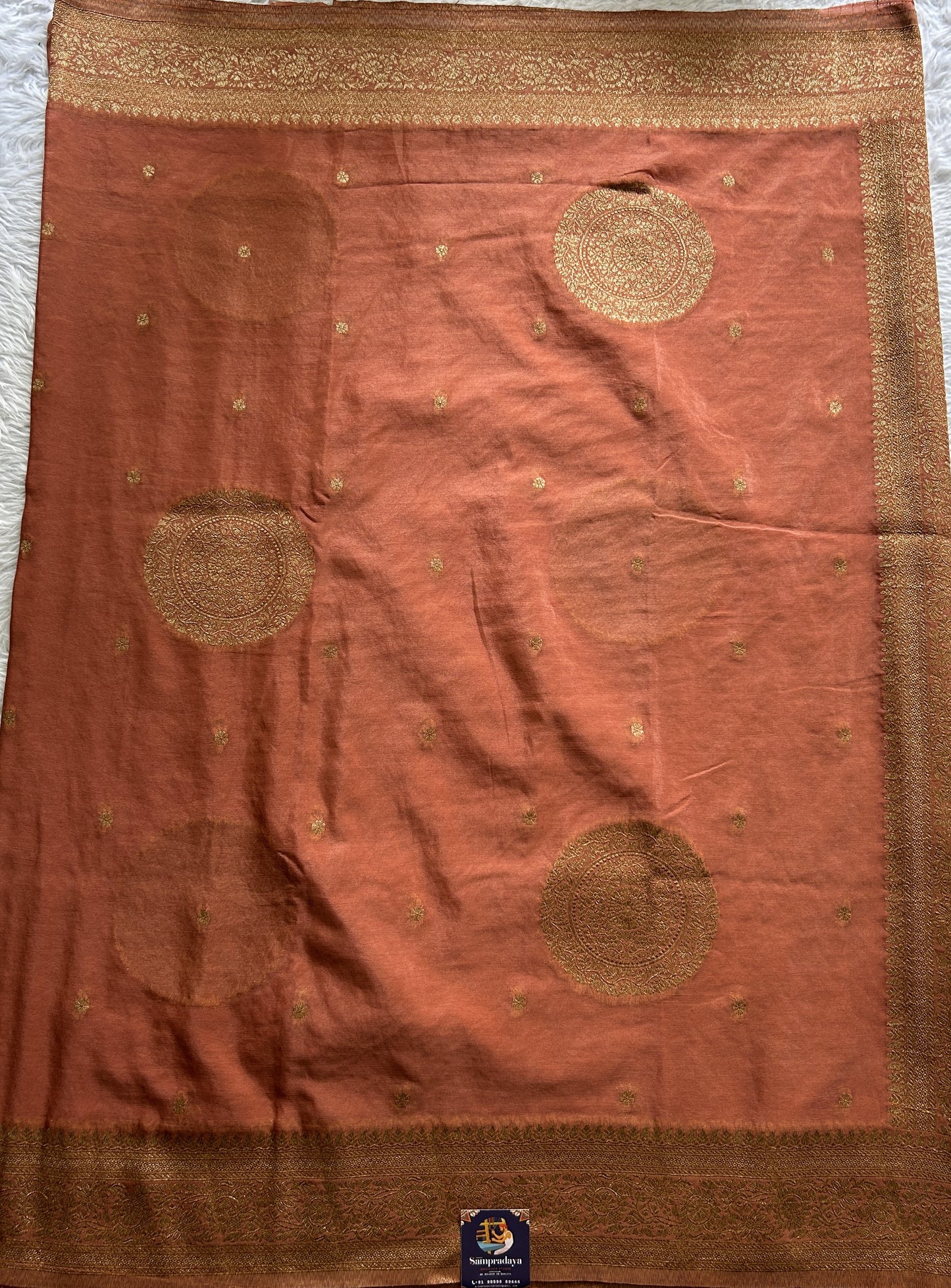 Semi Georgette Saree Dark Peach Colored Complemented with a Zari Border. - Sampradaya Designer Studio