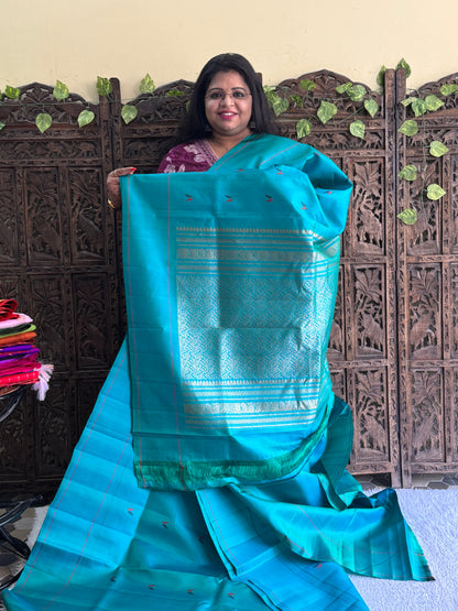 Gadwal Silk Saree Turquoise Colored Complemented With Plain Border - Sampradaya Designer Studio