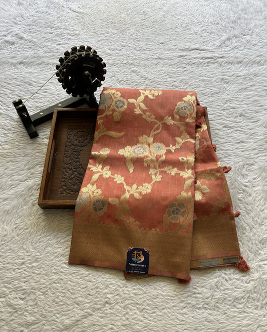Tissue Organza Saree Dark Peach Colored Elegantly Paired with a Zari Border. - Sampradaya Designer Studio