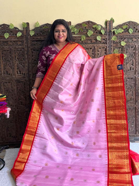 Gadwal Silk Saree Coral Pink Colored Complemented With Gold Zari Border