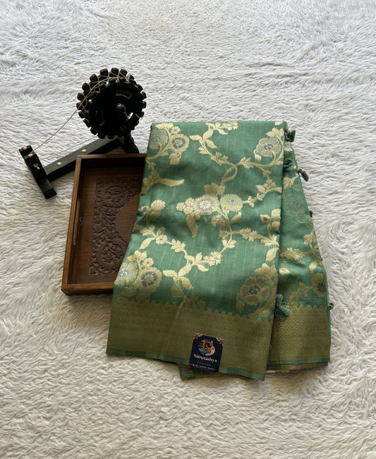 Tissue Organza Saree Sea Green Colored Elegantly Paired with a Zari Border. - Sampradaya Designer Studio