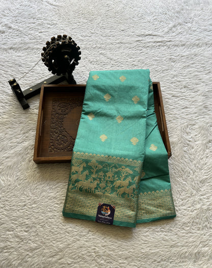 Semi Raw Silk Saree Aqua Blue Colored Complemented with a Zari Border. - Sampradaya Designer Studio