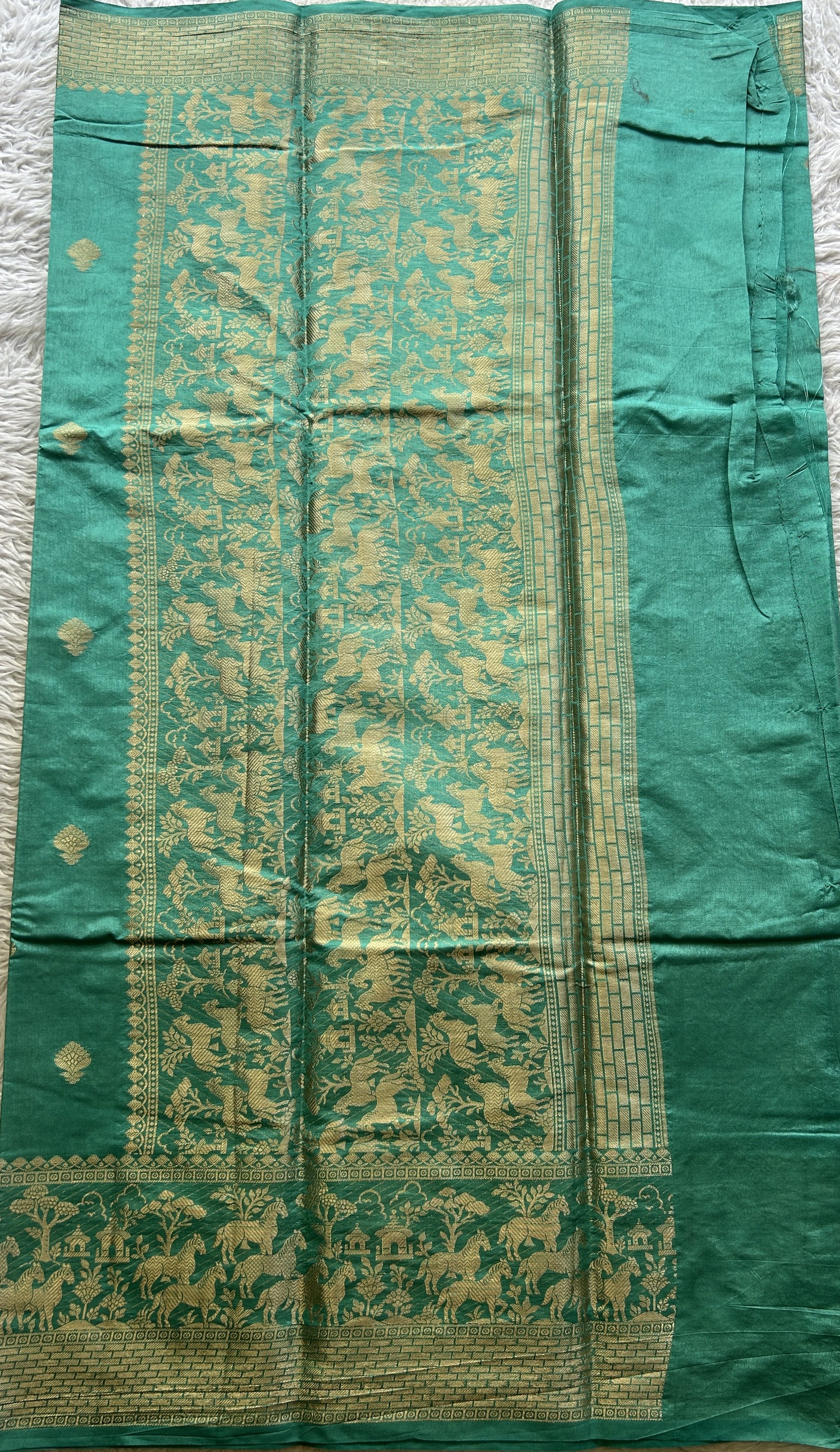 Semi Raw Silk Saree Aqua Blue Colored Complemented with a Zari Border. - Sampradaya Designer Studio