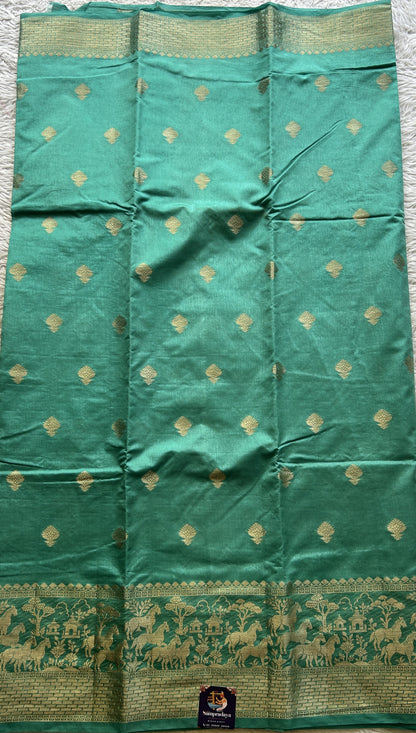 Semi Raw Silk Saree Aqua Blue Colored Complemented with a Zari Border. - Sampradaya Designer Studio