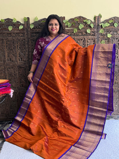 Gadwal Silk Saree Burnt Colored Complemented With Gold Zari Border - Sampradaya Designer Studio