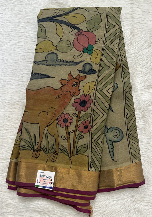 Pen Kalamkari Saree Olive Green colored allover saree complemented with a Magenta Colored Gold Zari border - Sampradaya Designer Studio