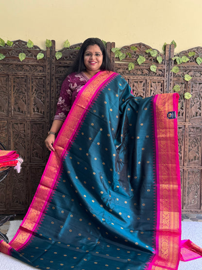 Gadwal Silk Saree Dark Teal Blue Colored Complemented With Gold Zari Border